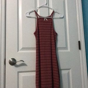 It is from the brand Mudd.Small in juniors.